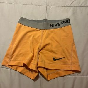 Orange Nike Pros